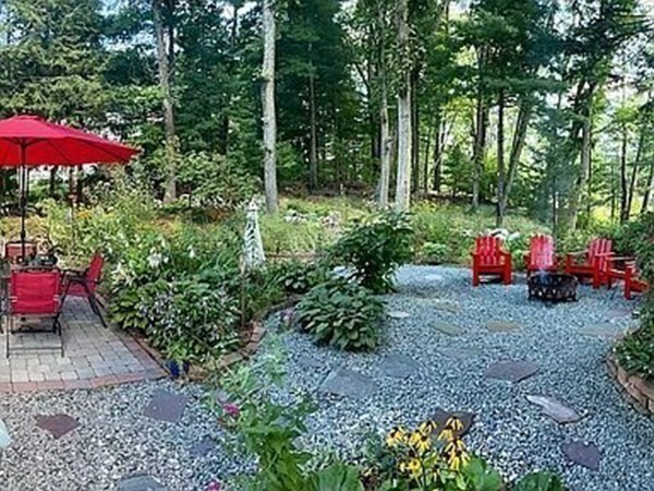 305 Potter Road Framingham, MA 01701 - Photo 18 of 21 a backyard with a table and chairs