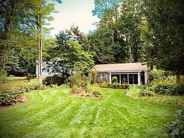 305 Potter Road Framingham, MA 01701 - Photo 3 of 21 a front view of a house with a yard