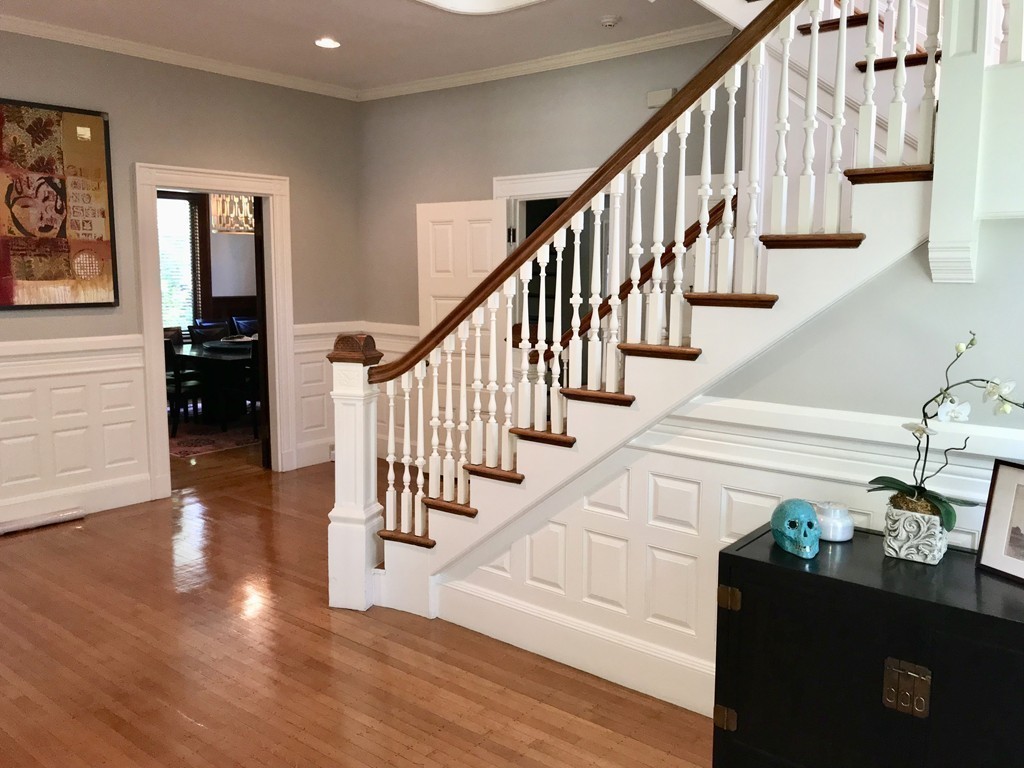 67 Temple Street Newton, MA 02465 - Photo 4 of 12 a view of entryway and hall with wooden floor