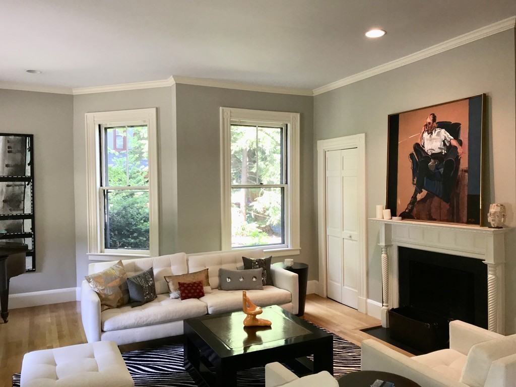 67 Temple Street Newton, MA 02465 - Photo 7 of 12 a living room with furniture a fireplace and a large window
