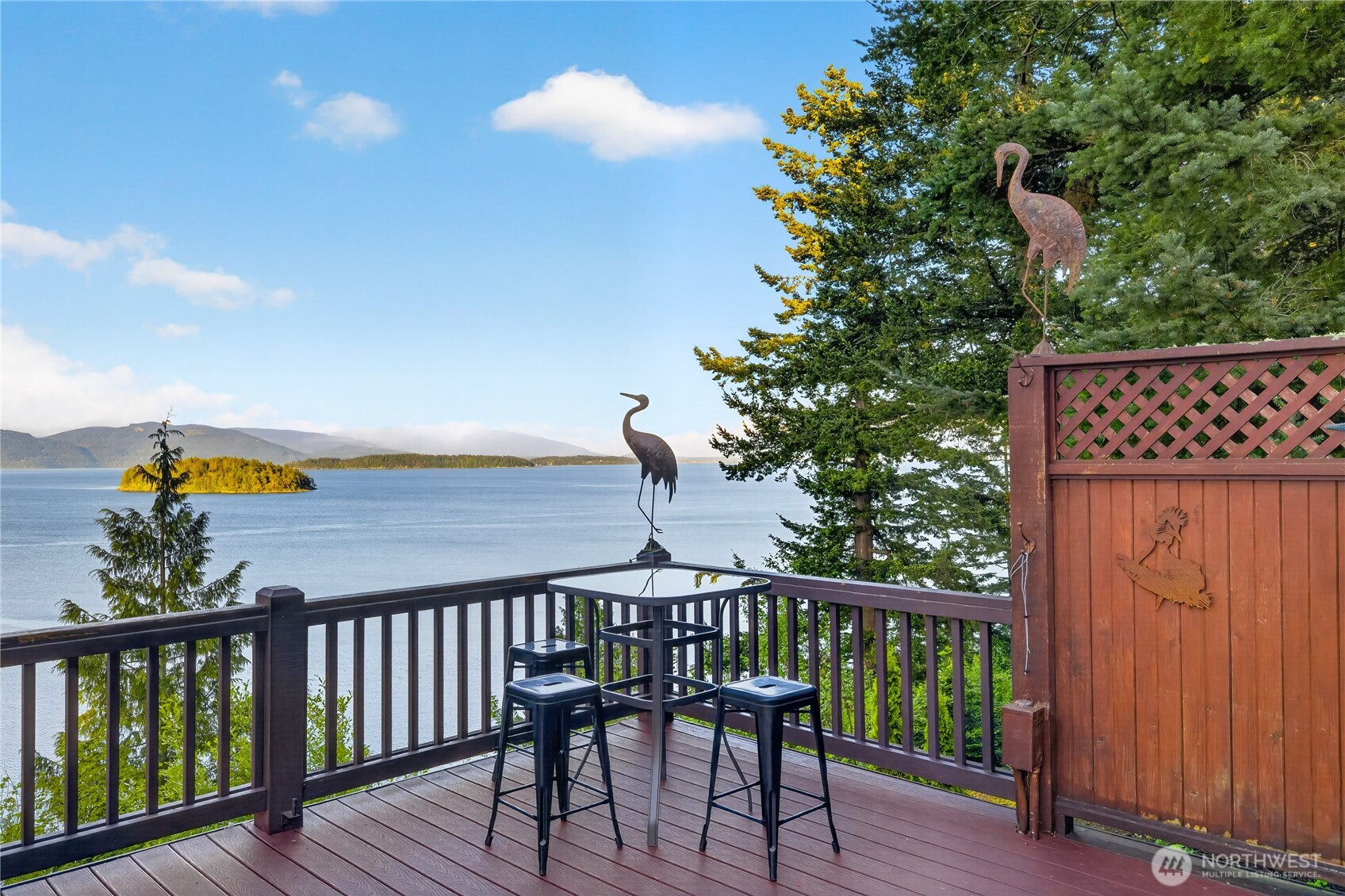 4623 Guemes Island Road Anacortes, WA 98221 - Photo 27 of 40 a balcony with wooden floor and fence
