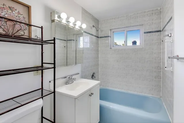 $409,900 | 7332 Davis Street, Morton Grove, IL 60053