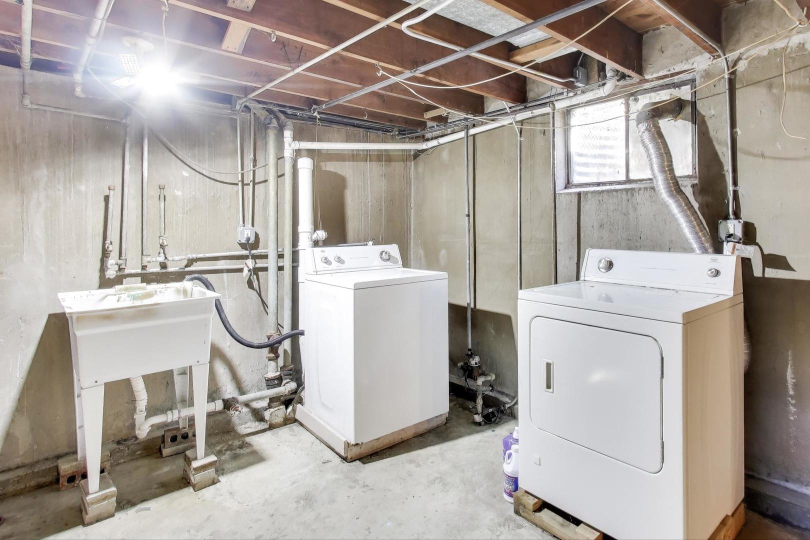 7332 Davis Street Morton Grove, IL 60053 - Photo 21 of 30 a utility room with dryer and washer