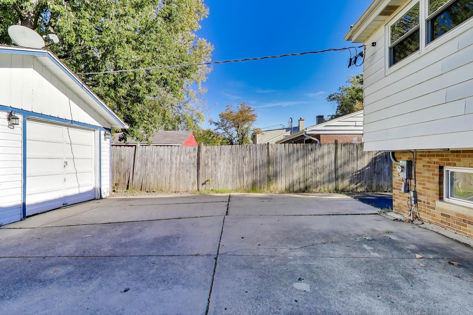 7332 Davis Street Morton Grove, IL 60053 - Photo 25 of 30 a view of backyard and tree