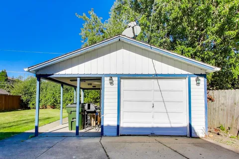 a house view with a garden space