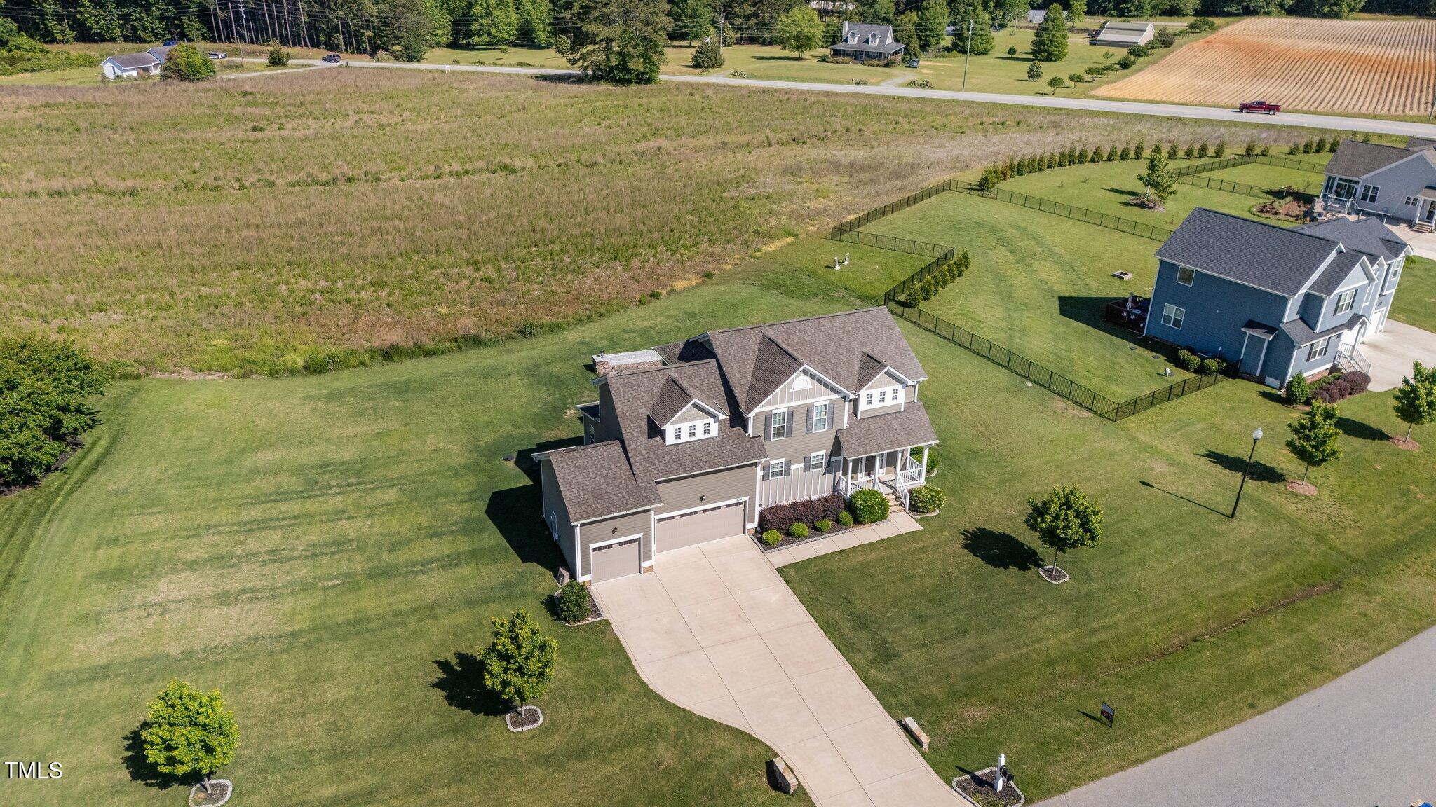 124 Brookstone Way Angier, NC 27501 - Photo 4 of 49 59-web-or-mls-DJI_20250508110504_0023_D