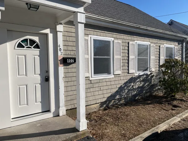 a front view of a house with windows