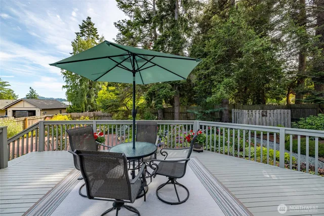 a view of house with outdoor seating