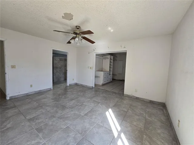 a view of kitchen with furniture and window