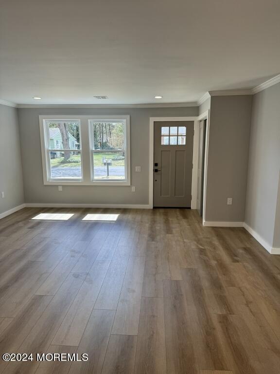 57 A Sunset Road Whiting, NJ 08759 - Photo 11 of 29 an empty room with wooden floor and windows