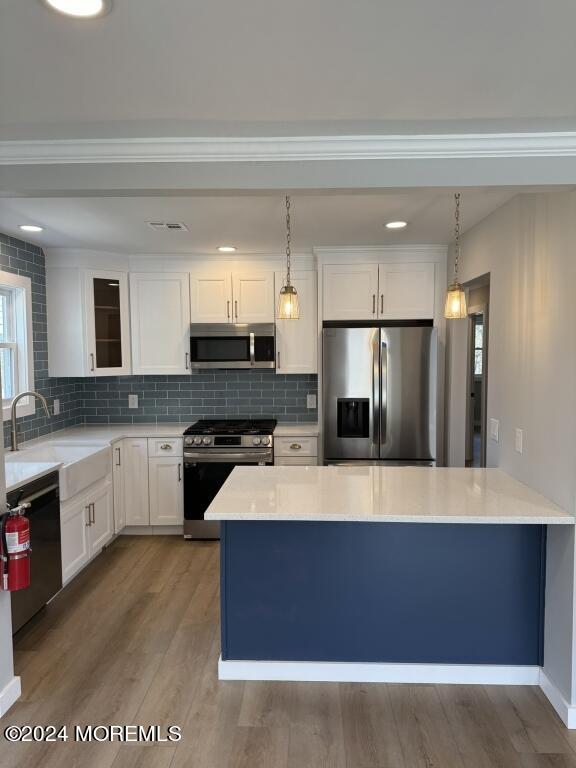 57 A Sunset Road Whiting, NJ 08759 - Photo 2 of 29 a large kitchen with stainless steel appliances kitchen island granite countertop a refrigerator a oven a sink with white cabinets and wooden floor