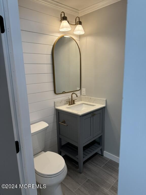 57 A Sunset Road Whiting, NJ 08759 - Photo 22 of 29 a bathroom with a toilet a sink and mirror