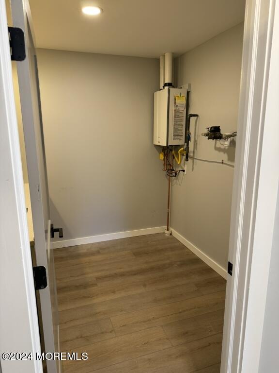 57 A Sunset Road Whiting, NJ 08759 - Photo 27 of 29 a view of a hallway with wooden floor and staircase