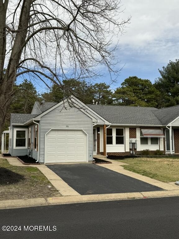 57 A Sunset Road Whiting, NJ 08759 - Photo 29 of 29 a view of a white house with a tree and a yard