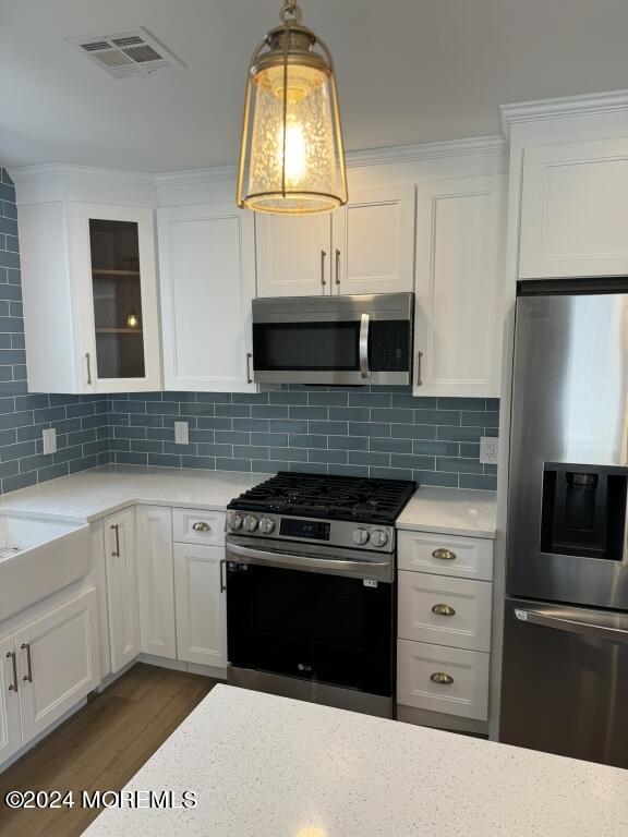 57 A Sunset Road Whiting, NJ 08759 - Photo 4 of 29 a kitchen with granite countertop a stove and a sink