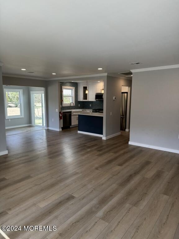 57 A Sunset Road Whiting, NJ 08759 - Photo 8 of 29 an empty room with wooden floor and windows