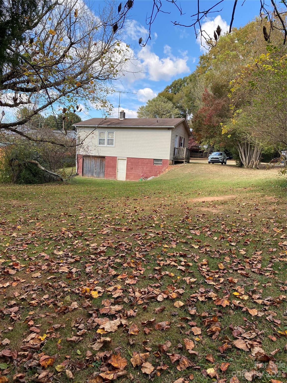 71 Hunter Bridge Road Stony Point, NC 28678 - Photo 21 of 26 a view of a house with a yard
