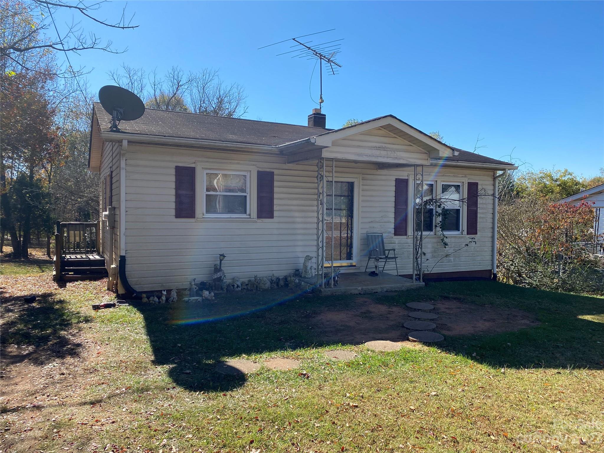 71 Hunter Bridge Road Stony Point, NC 28678 - Photo 5 of 26 a front view of a house with a yard