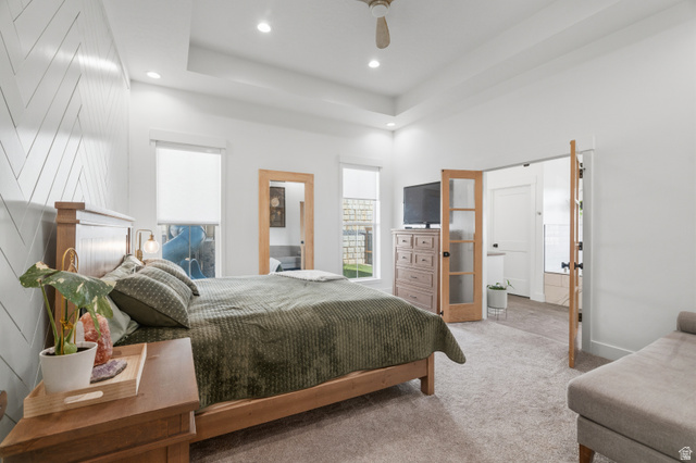 2013 South 100 West Perry, UT 84302 - Photo 22 of 49 Bedroom featuring a tray ceiling with recessed lighting, wood-finish ceiling fan, and carpeted flooring