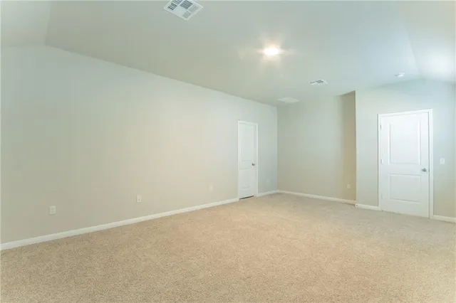 an empty room with an entryway