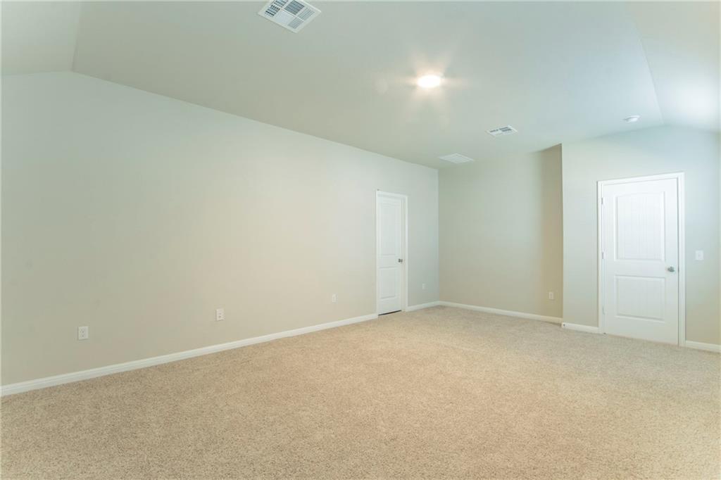 172 Arrowhead Vine Street Leander, TX 78641 - Photo 11 of 21 an empty room with an entryway