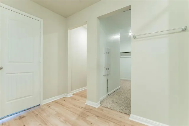a view of hallway with shower
