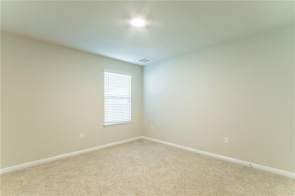 172 Arrowhead Vine Street Leander, TX 78641 - Photo 14 of 21 an empty room with a window