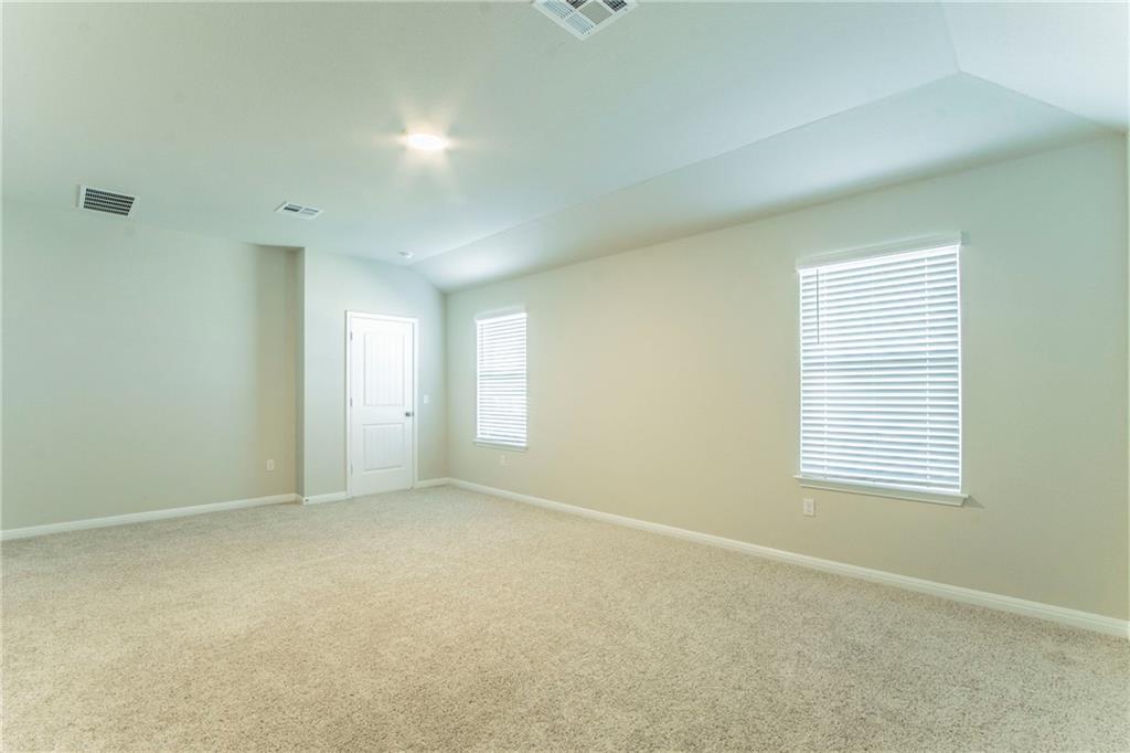 172 Arrowhead Vine Street Leander, TX 78641 - Photo 10 of 21 a view of an empty room with a window