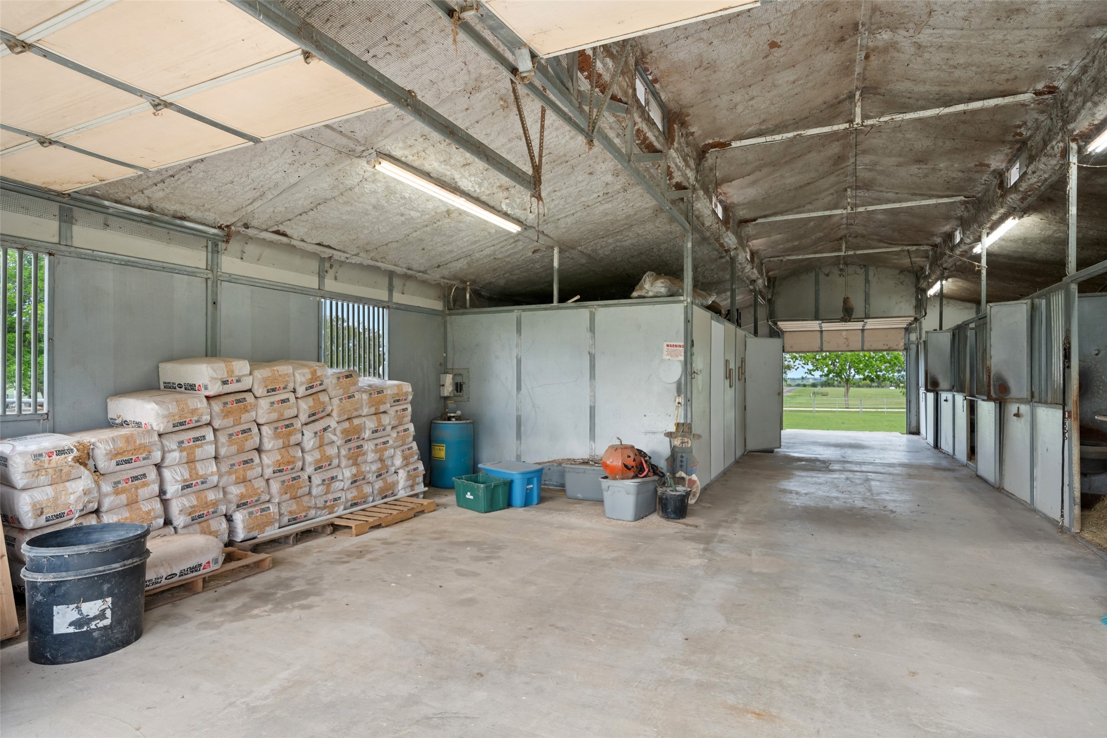 119 Fm 1891 Shiner, TX 77984 - Photo 18 of 40 a view of a garage with wooden walls