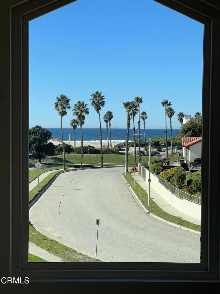 4510 Antigua Way Oxnard, CA 93035 - Photo 4 of 16 a view of a swimming pool with a yard