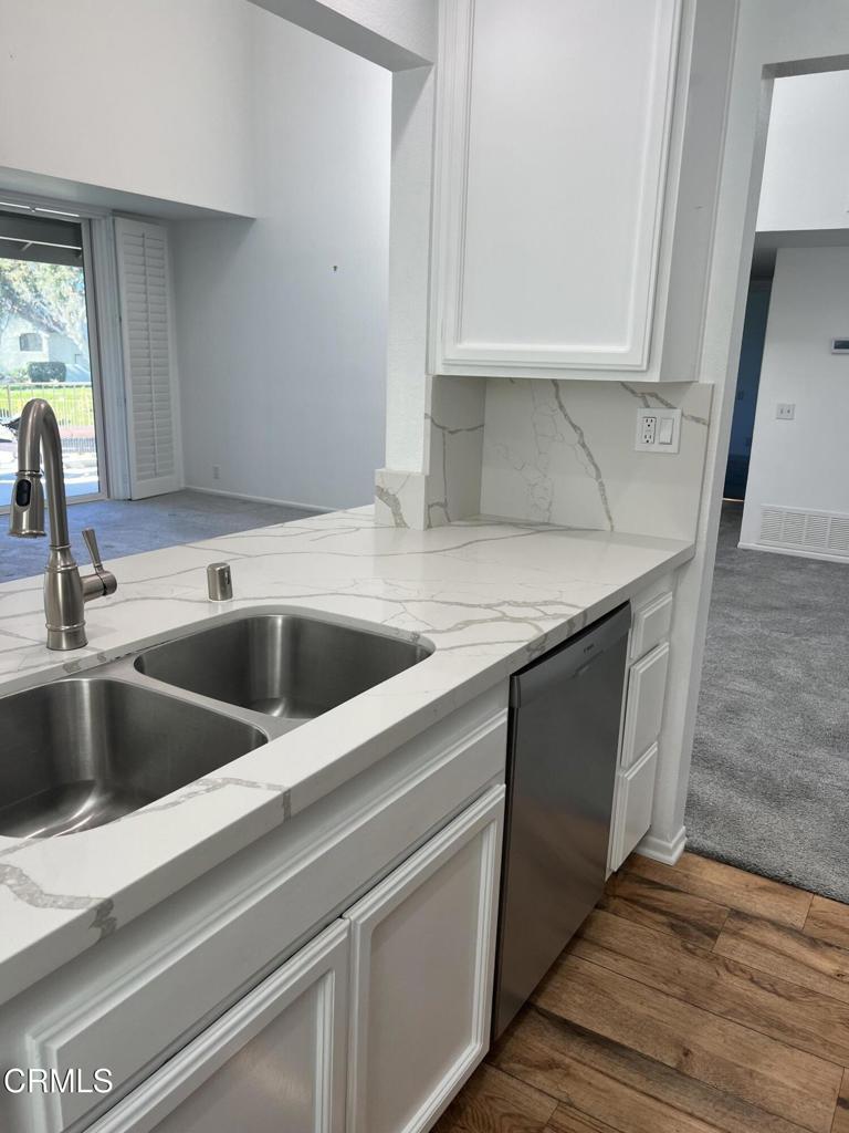 4510 Antigua Way Oxnard, CA 93035 - Photo 7 of 16 a view white cabinets and sink