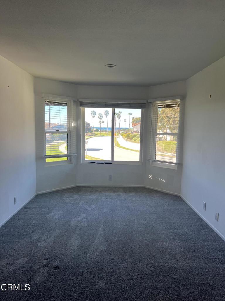 4510 Antigua Way Oxnard, CA 93035 - Photo 8 of 16 a view of an empty room with a window