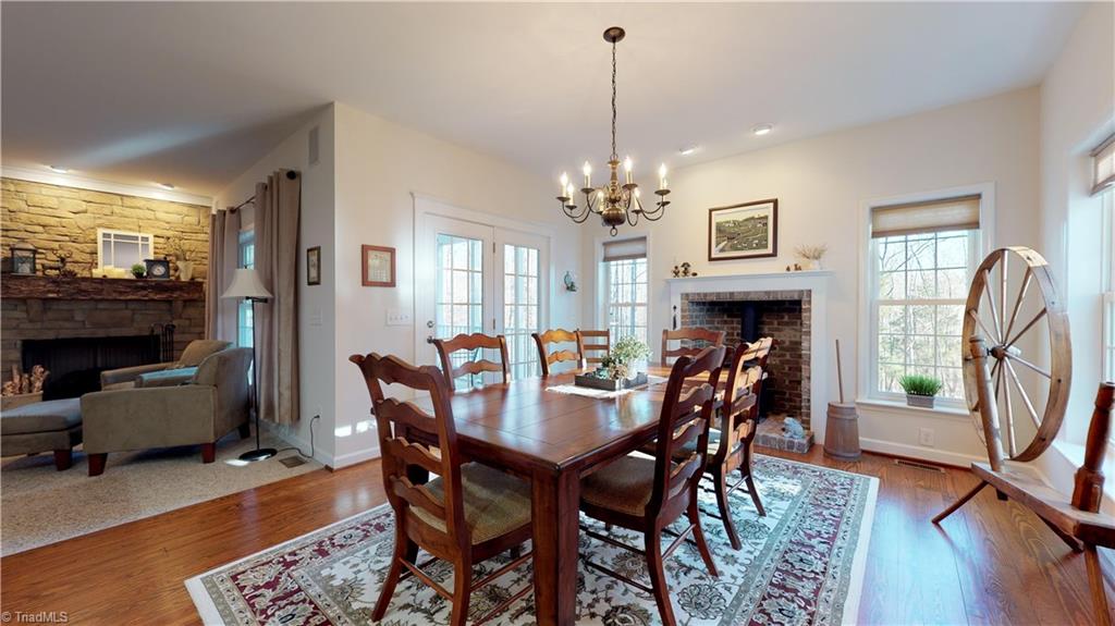 371 Foulks Road Madison, NC 27025 - Photo 14 of 30 Keeping / dining room has gas stove for cozy dinners.