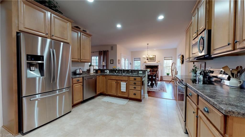 371 Foulks Road Madison, NC 27025 - Photo 15 of 30 Kitchen with maple cabinets and Stainless appliances!
