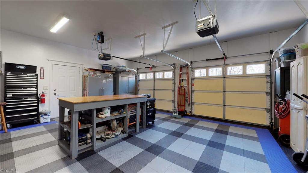 371 Foulks Road Madison, NC 27025 - Photo 20 of 30 Garage / workshop with interlocking floor.