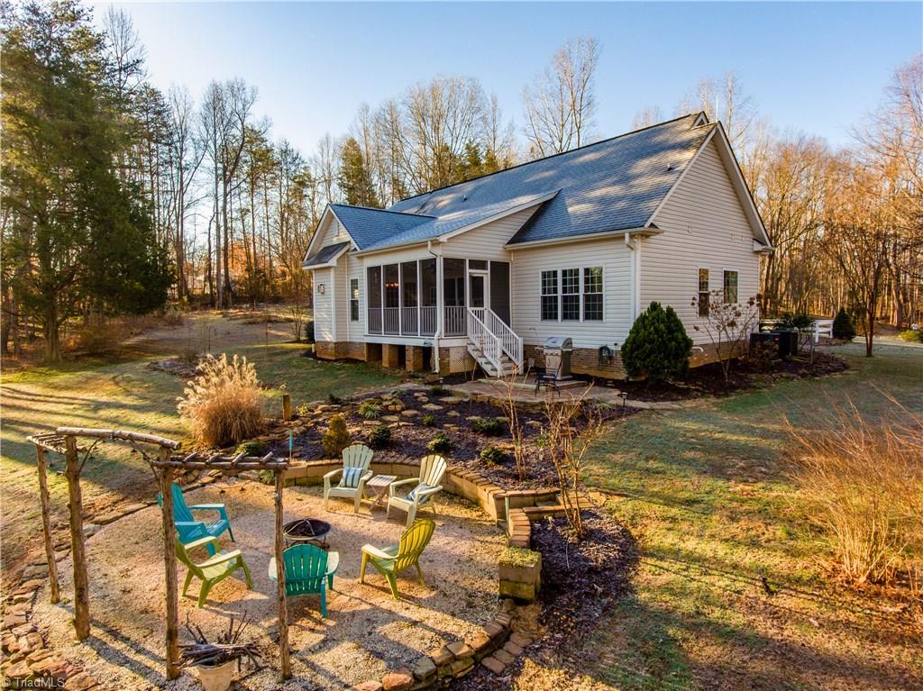 371 Foulks Road Madison, NC 27025 - Photo 7 of 30 Watch the stars from the backyard fire pit.