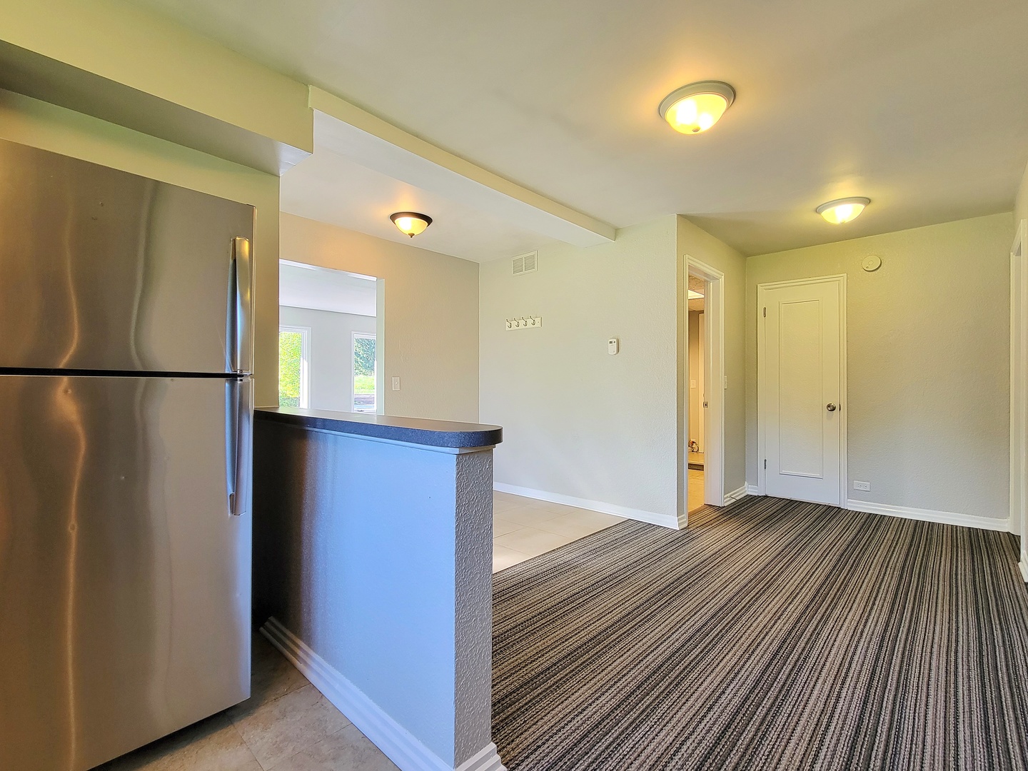 28W450 Roosevelt Road Winfield, IL 60190 - Photo 14 of 28 a view of a hallway with wooden floor