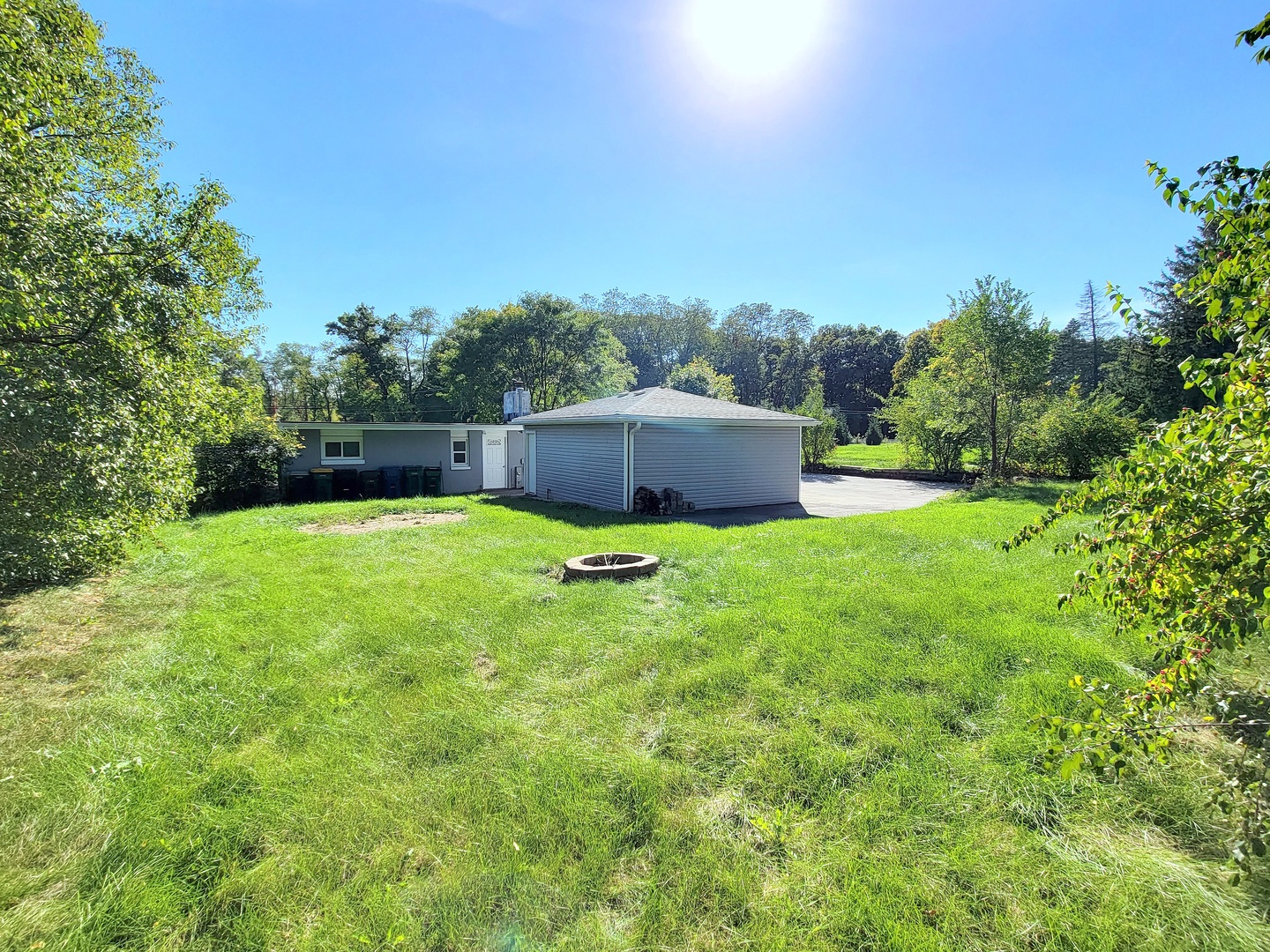 28W450 Roosevelt Road Winfield, IL 60190 - Photo 24 of 28 a view of a backyard with a garden