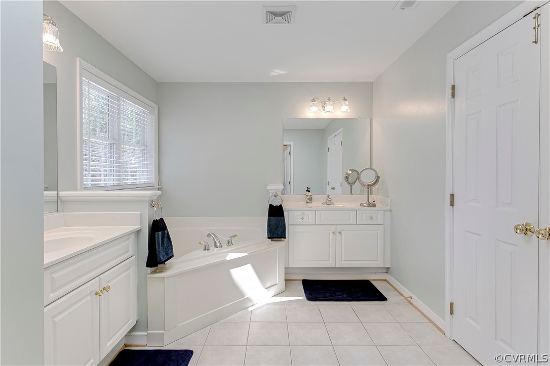 3504 Robious Forest Way Midlothian, VA 23113 - Photo 24 of 38 The Master Bathroom includes tile floors, His and