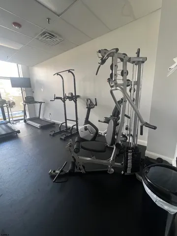 a view of a room with gym equipment