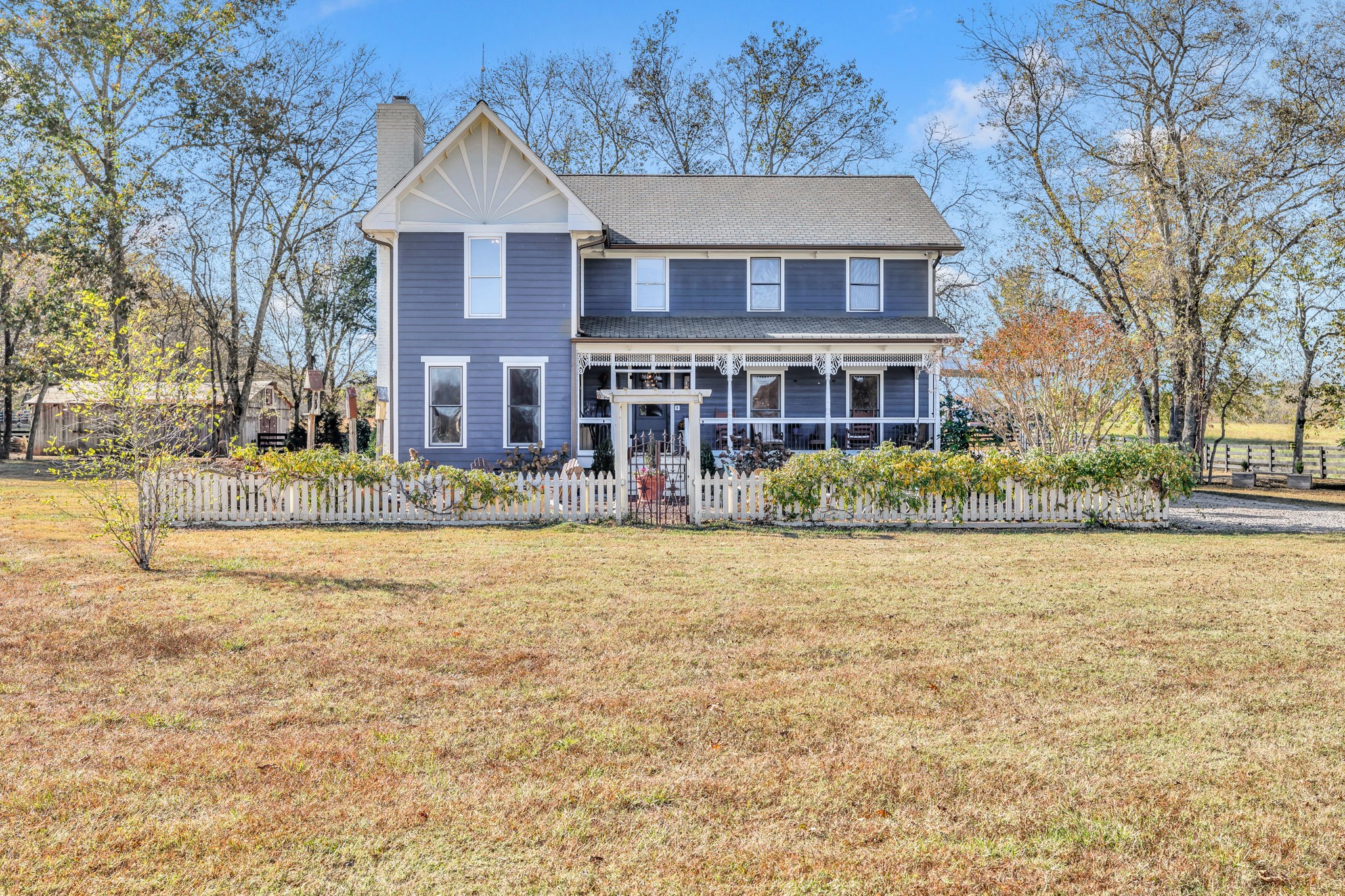 3111 Carl Road Franklin, TN 37064 - Photo 1 of 65 a front view of a house with a yard and large trees