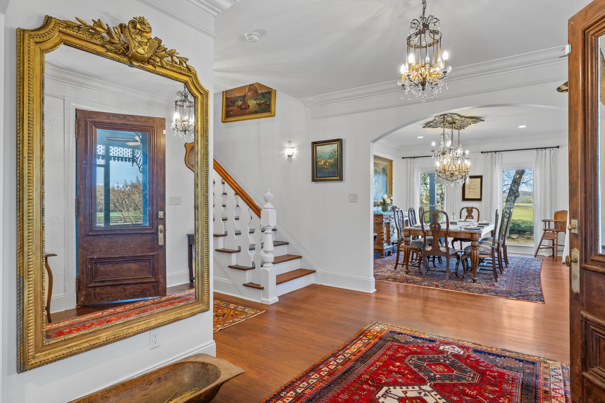 3111 Carl Road Franklin, TN 37064 - Photo 11 of 65 a view of a dining room with furniture wooden floor and chandelier