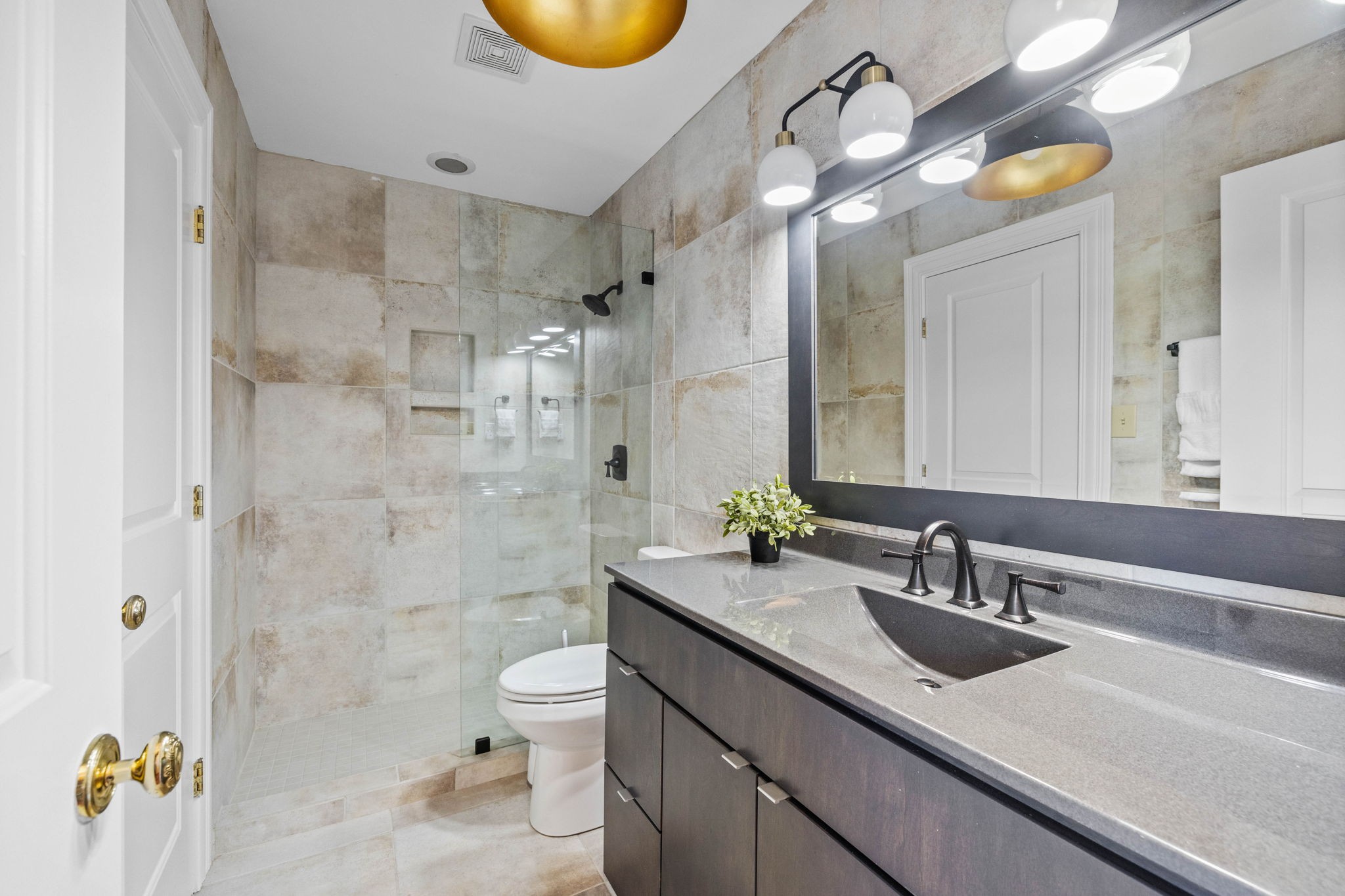 3111 Carl Road Franklin, TN 37064 - Photo 41 of 65 a bathroom with a sink a toilet and shower