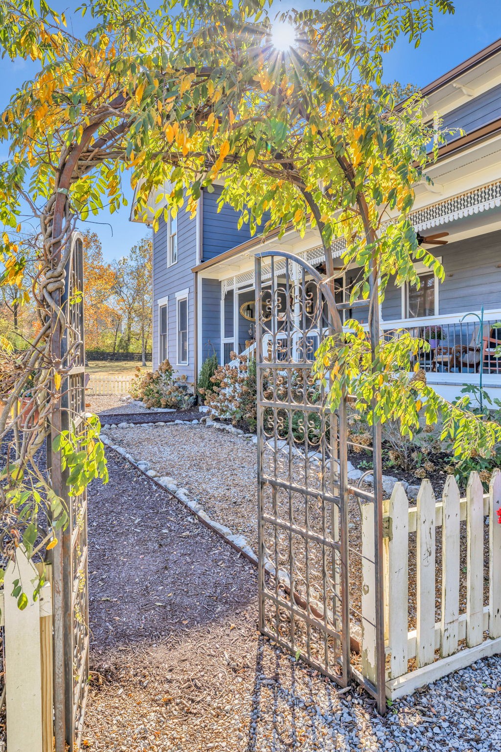 3111 Carl Road Franklin, TN 37064 - Photo 5 of 65 a front view of a house with a garden