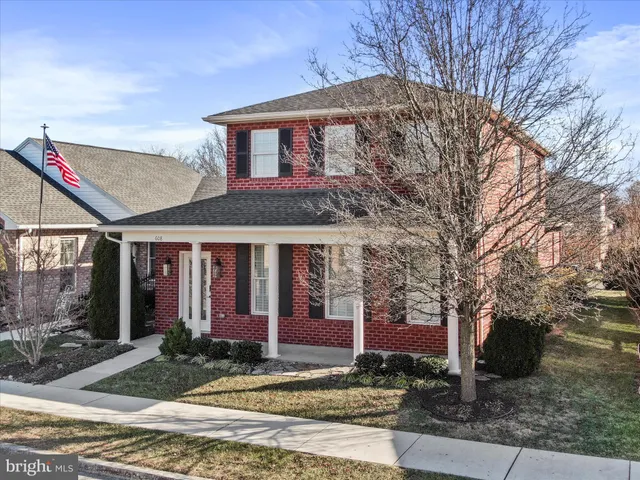 an aerial view of a house with swimming pool