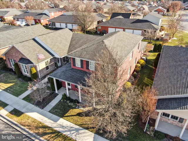a front view of a house with a garage