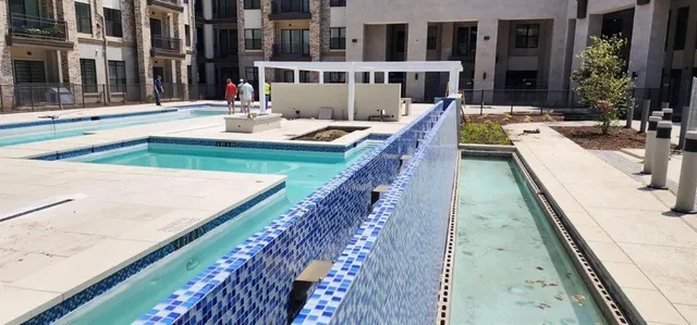 a view of swimming pool with outdoor seating