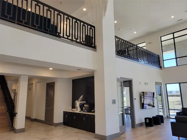 a view of living room with furniture and staircase