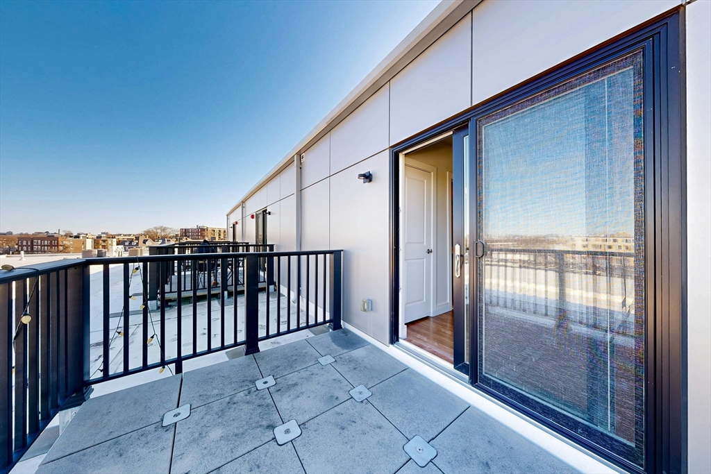 446 Cambridge Street, Unit 406 Boston, MA 02134 - Photo 7 of 7 a view of a balcony