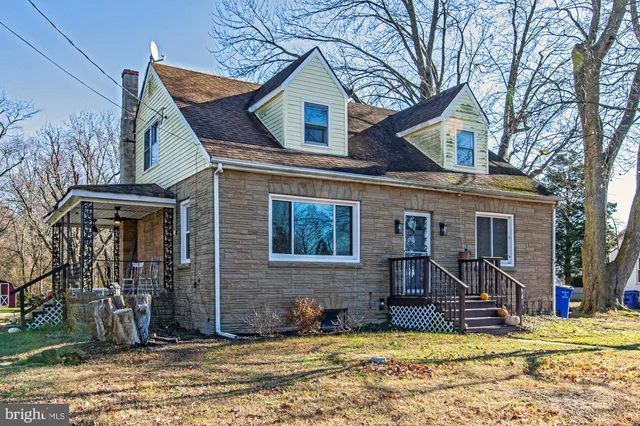 a view of a house with snow on the roof